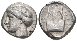 IONIA. Kolophon. (After circa 394 BC). AR Tetradrachm.
Obv: Laureate head of Apollo to left
Rev: lyre, uncertain magistrate's name; all within squar...
