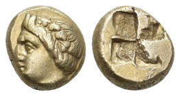 IONIA. Phokaia. EL Hekte (Circa 478-387 BC).
Obv: Head of Dionysos left, wearing ivy wreath; to right, seal downward.
Rev: Quadripartite incuse squa...