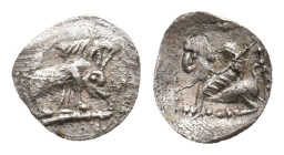 CARIA. Uncertain. AR Tetartemorion (4th century BC).
Obv: Boar grazing rigth.
Rev: Sphinx seated left within pelleted linear border.
Asia Minor Coi...