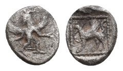 CARIA. Kaunos. (Circa 490-470 BC). AR Hemiobol
Obv: Winged Iris with outstretched hands in kneeling-running position to right, head left
Rev:Griffin...