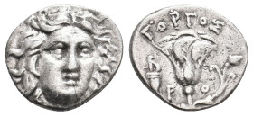 CARIA. Rhodes. (Circa 304-166 BC). Gorgos, magistrate. AR Drachm.
Obv: Head of Helios facing slightly right.
Rev: ΓOPΓOΣ / P - O.
Rose with bud to ...