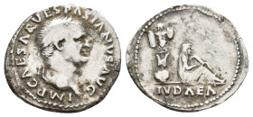 VESPASIAN, 69-79 AD. AR, Denarius. Rome. "Judaea Capta" issue.
Obv: IMP CAESAR VESPASIANVS AVG.
Laureate head of Vespasian, right.
Rev: IVDAEA.
Ju...