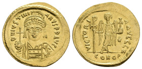 JUSTINIAN I, 527-565 AD. AV, Solidus. Constantinople.
Obv: D N IVSTINIANVS P P AVG.
Helmeted and cuirassed bust facing, holding globus cruciger and ...