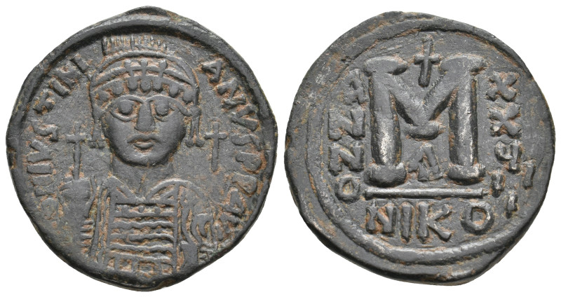 JUSTINIAN I, 527-565 AD. AE, Follis. Nicomedia.
Obv: D N IVSTINIANVS P P AVG.
...