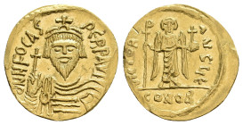 PHOCAS, 602-610 AD. AV, Solidus. Constantinople.
Obv: δN FOCAS PЄRP AVI.
Crowned and cuirassed facing bust, holding globus cruciger.
Rev: VICTORIA ...