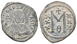 THEOPHILUS, 829-842 AD. AE, Follis. Constantinople.
Obv: ✷ ΘЄOFIL ЬASIL.
Crowned and draped bust facing, holding patriarchal cross and akakia.
Rev:...