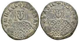 MICHAEL III 'THE DRUNKARD' with BASIL I, 842-867 AD. AE, Follis. Constantinople.
Obv: + MIҺAЄL IMPЄRAT.
Crowned facing bust of Michael, holding akak...