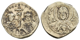 MICHAEL VII DUCAS and MARIA, 1071-1078 AD. Electrum, Tetarteron. Constantinople.
Obv: + Θ KЄ [BOHΘ / MHP - ΘV.
Facing bust of the Virgin Mary, holdi...