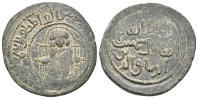 Islamic. Anatolia & al-Jazira (Post-Seljuk). Danishmendids (Sivas). SHAMS AL-DIN ISMA'IL, 1164-1172 AD /559-567 AH. AE, Dirham.
Obv: Male figure seat...