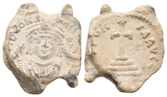 PB Byzantine seal of Tiberius II Constantine (578-582).
Obv: Crowned facing bust, wearing consular robes, holding mappa and eagle-tipped scepter surm...