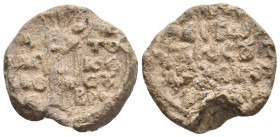 PB Byzantine seal (7th-8th century AD).
Obv: The Mother of God standing, holding the Child in her left arm. Inscription on either side. Wreath border...