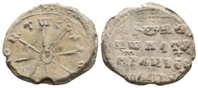 PB Byzantine seal (10th century AD).
Obv: An invocation with the letters at each end of an eight-rayed star. Not all letters preserved. A border of p...