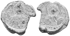 PB Byzantine iconographic seal (10th-11th century AD).
Obv: Bust of a saint holding a spear. Details indistinct. Illegible traces of epigraphy on eit...