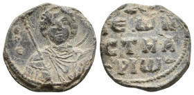PB Byzantine seal (11th century AD).
Obv: Bust of St George holding a spear and shield. Inscription on either side: ὁ ἅ(γιος) Γε[ώργ(ιος)]. Border of...