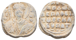 PB Byzantine seal of Theodoros protospatharios epi tou Chrysotriklinou and hypatos (11th century AD).
Obv.: Bust of St Theodore holding a spear and s...