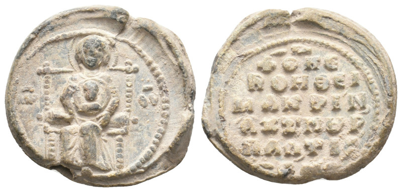 PB Byzantine seal (11th-12th century AD).
Obv.: The Mother of God seated on a t...
