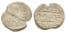 PB Byzantine kufic seal (c. 11th-12th century AD).
Obv.: Bust of the Mother of God, her hands before her. Sigla on either side: Μή(τη)ρ Θ(εο)ῦ. Borde...