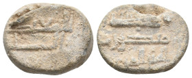 PB Islamic. Uncertain kufic seal (c. 7th-10th century AD).
Obv: Kufic inscription.
Rev: Kufic inscription.
Condition: Fine.
Weight: 10.45 g.
Diam...