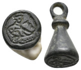 AE Byzantine stamp seal (7th-9th century AD).
Byzantine bronze stamp seal with bird.
Condition: Very Fine.
Weight: 6.24 g.
Diameter: 20.9 mm.