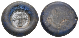 Byzantine glass weight for 1 semissis, Theodoros? (6.-7. century AD).
Obv: Cruciform monogram of ΘEOΔΩPOY?
Rev: Plain.
Cf. Nomos Obolos 22, 772.
C...
