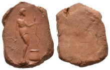 Graeco-Roman clay seal impression (1st-3rd century AD).
Obv: Hygieia standing, right, holding branch in right hand and serpent in left; in front, jug...
