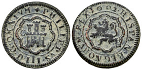 Philip III (1598-1621). 4 maravedis. 1602. Segovia. C. (Cal-252). Ae. 6,10 g. VF. Est...30,00. 

Spanish description: Felipe III (1598-1621). 4 mara...