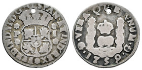 Ferdinand VI (1746-1759). 1 real. 1759. Guatemala. P. (Cal-141). Ag. 3,04 g. Holed. Rare. Choice F. Est...120,00. 

Spanish description: Fernando VI...