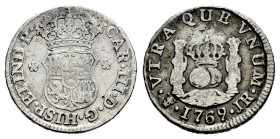 Charles III (1759-1788). 1/2 real. 1769. Potosí. JR. (Cal-236). Ag. 1,55 g. Choice F/Almost VF. Est...30,00. 

Spanish description: Carlos III (1759...