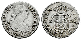 Charles IV (1788-1808). 1/2 real. 1802. Sevilla. CN. (Cal-360). Ag. 1,42 g. Choice VF. Est...70,00. 

Spanish description: Carlos IV (1788-1808). 1/...