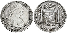 Charles IV (1788-1808). 8 reales. 1807. Mexico. TH. (Cal-986). Ag. 26,95 g. Lightly rubbed. Choice VF. Est...90,00. 

Spanish description: Carlos IV...