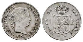 Elizabeth II (1833-1868). 1 real. 1858/7. Barcelona. (Cal-281). Ag. 1,27 g. Weakly struck but visible overdate. VF. Est...30,00. 

Spanish descripti...