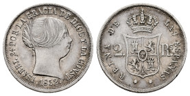 Elizabeth II (1833-1868). 2 reales. 1852/552. Sevilla. (Cal-389). Ag. 2,54 g. Rare overdate. Almost XF/Choice VF. Est...120,00. 

Spanish descriptio...
