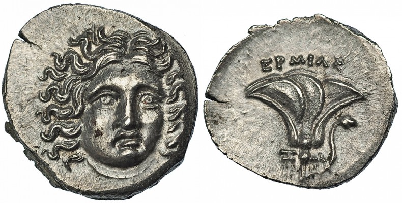 ISLAS DE CARIA. Rodas. Dracma (304-189 a.C.). A/ Cabeza de Helios de frente a de...