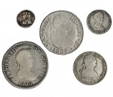 Lote de 5 monedas de plata. 1/4 de real. 1820. Lima; 1/2 real. 1831. Sevilla; 1 real. 1806. México; 2 reales. 1808. Sevilla (Carlos IV); 2 reales. 182...