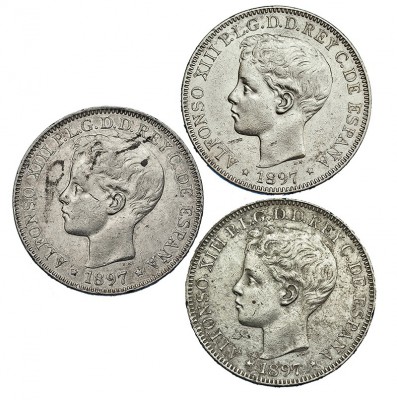 Lote de 3 monedas de 1 peso. 1897. Manila. SGV. VII-192. Conservación media MBC+...