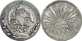México. 1869. México. CH. 8 reales. (Kr. 377.10). Resellos orientales. AG. 26,73 g. MBC-.