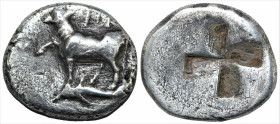 Greek
THRACE. Byzantion. (Circa 350-300 BC) 
AR siglos (16mm 4.8g) 
Obv: Bull standing left on dolphin left; ΠY above 
Rev: Quadripartite incuse squar...