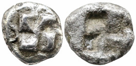 Greek
IONIA. Uncertain. (Circa 625-600 BC).
1/12 Stater or Diobol (7mm 1g)
Obv: Raised swastika pattern surrounded by crescents.
Rev: Quadripartite in...