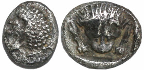 Greek
CARIA. Uncertain. (Circa 5th century BC).
AR Obol (5.5mm 0.5g)
Obv: Forepart of a roaring lion left.
Rev: Facing panther's head within incus...