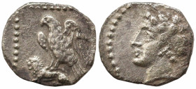 Greek
CILICIA. Uncertain. (4th century BC).
AR Obol (8.2mm 0.54g)
Obv: Head left, wearing wreath of grain ears
Rev: Eagle, with spread wings, stan...