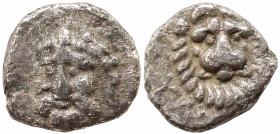 Greek
CILICIA. Isaura. (Circa 333-322 BC)
AR Hemiobol (4.8mm 0.3g).
Obv: Head of Herakles facing slightly left
Rev: Head of lion facing, YΛYPCOM(s...