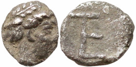 Greek
IONIA. Kolophon (490-400 BC).
AR Tetartemorion (3.2mm 0.24g)
Obv: head of Apollo right.
Rev: TE monogram in incuse square.
Milne NNM 96, 34...