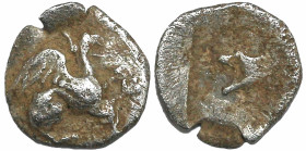 Greek
IONIA. Teos. (Circa 5th Century BC).
AR Tetartemorion (5mm 0.2g)
Obv: Griffin right.
Rev: Astragalos.
Klein KM p. 60, 475.