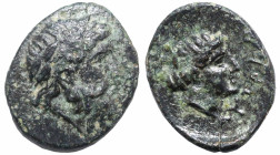Greek
AEOLIS. Autokane. (3rd century BC).
AE Bronze (9mm 0.84g)
Obv: Laureate head of Zeus right.
Rev: AYTOKA. Head of Dionysos right.
SNG Ashmol...