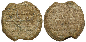 Byzantine Lead Seal ( 6th century)
Obv: Cruciform monogram
Rev: 4 (four) lines of text.
(25.14 g, 28 mm diameter)