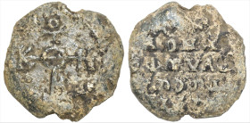 Byzantine Lead Seal ( 6th century)
Obv: Cruciform monogram
Rev: 4 (four) lines of text.
(13.95 g, 22 mm diameter)