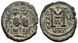 (Bronze, 12.48g 30mm)

BYZANTINE EMPIRE. Justin II, with Sophia. 565-578. Æ follis.