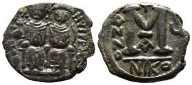 (Bronze, 8.26g 27mm)

BYZANTINE EMPIRE. Justin II, with Sophia. 565-578. Æ follis.