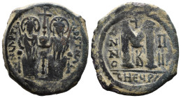 (Bronze, 13.99g 29mm)

BYZANTINE EMPIRE. Justin II, with Sophia. 565-578. Æ follis.