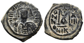 (Bronze, 10.66g 27mm)

Byzantine Maurice Tiberius (582-602 AD) Constantinople AE Follis